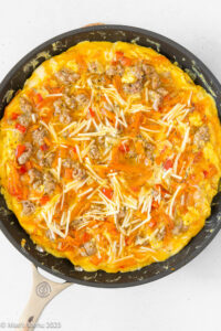 A large skillet of sweet potato frittata as it cooks.