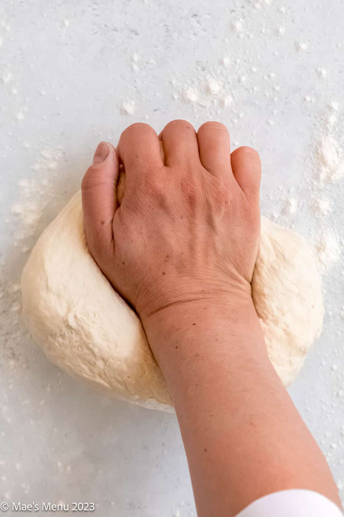 Kneading the air fryer bread dough.