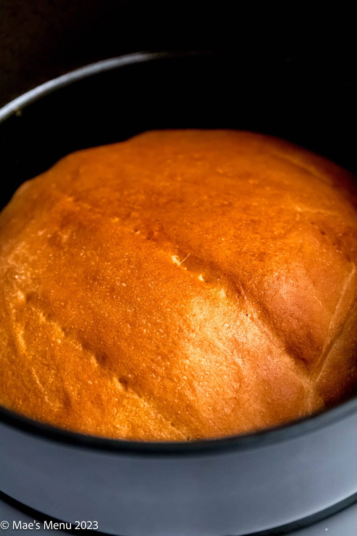 Air fryer bread in a air fryer basket.