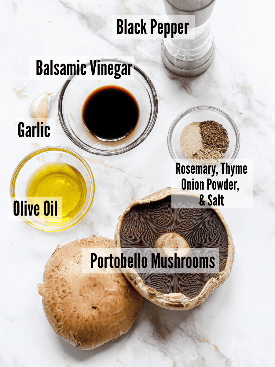 All of the ingredients for air fryer portobello mushrooms on a white background.