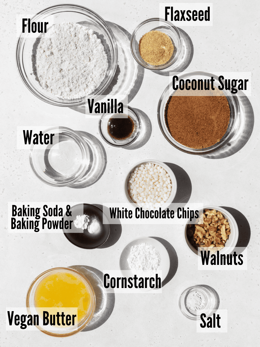 All of the ingredients for vegan blondies on a white background.