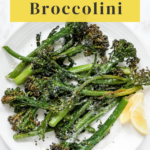 Air fryer broccolini pin with a plate of the broccolini.