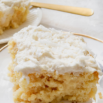 A pinterest pin for pineapple poke cake with a shot of the cake on a dessert plate.