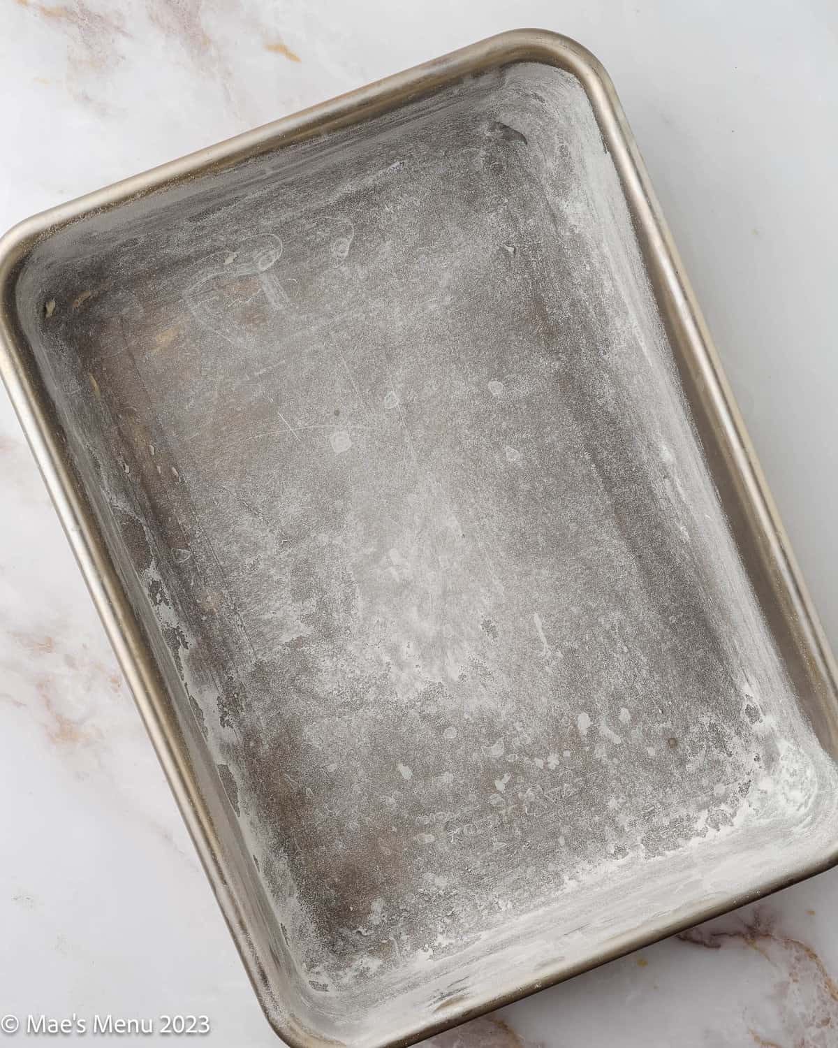 A prepared cake pan on the counter.