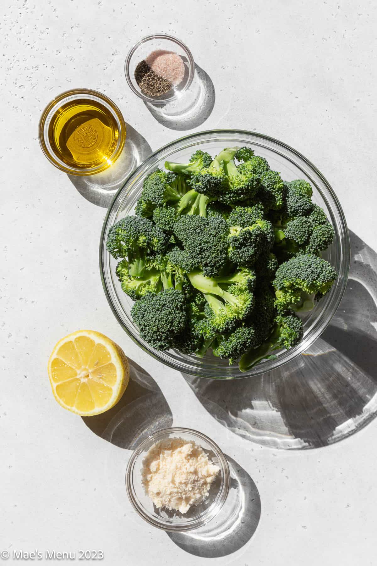 All of the ingredients for roasted broccoli on the counter.