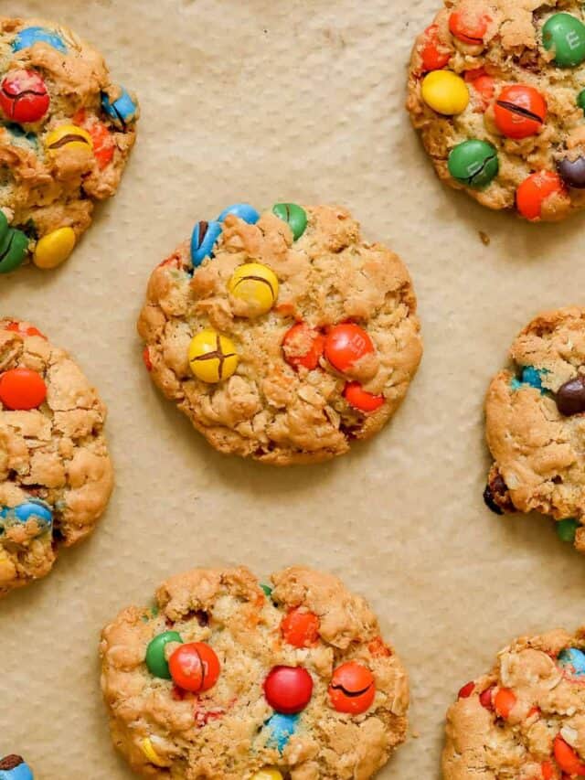 oatmeal M&M cookies finished cooking on parchment paper