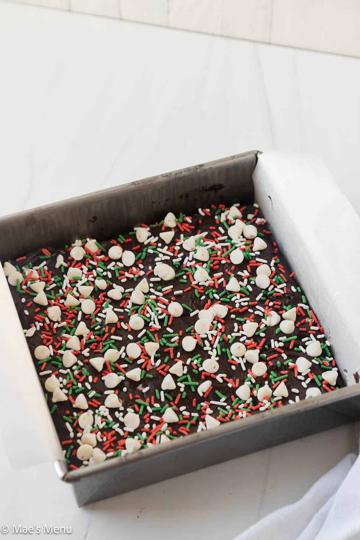The peppermint Christmas brownies in a baking dish before baking.