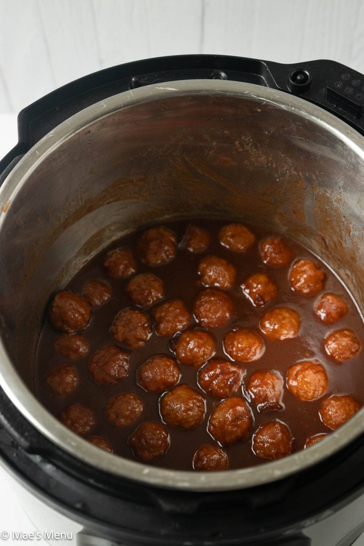 Freshly cooked cranberry meatballs in the instant pot.
