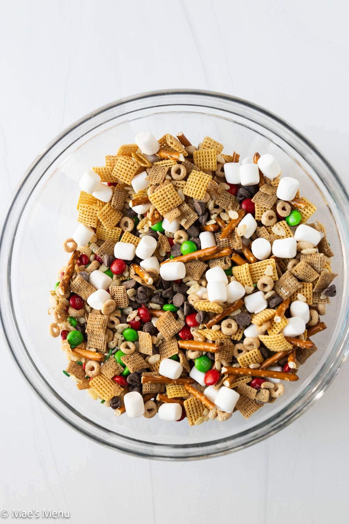Holiday check mix ingredients combined in a mixing bowl.
