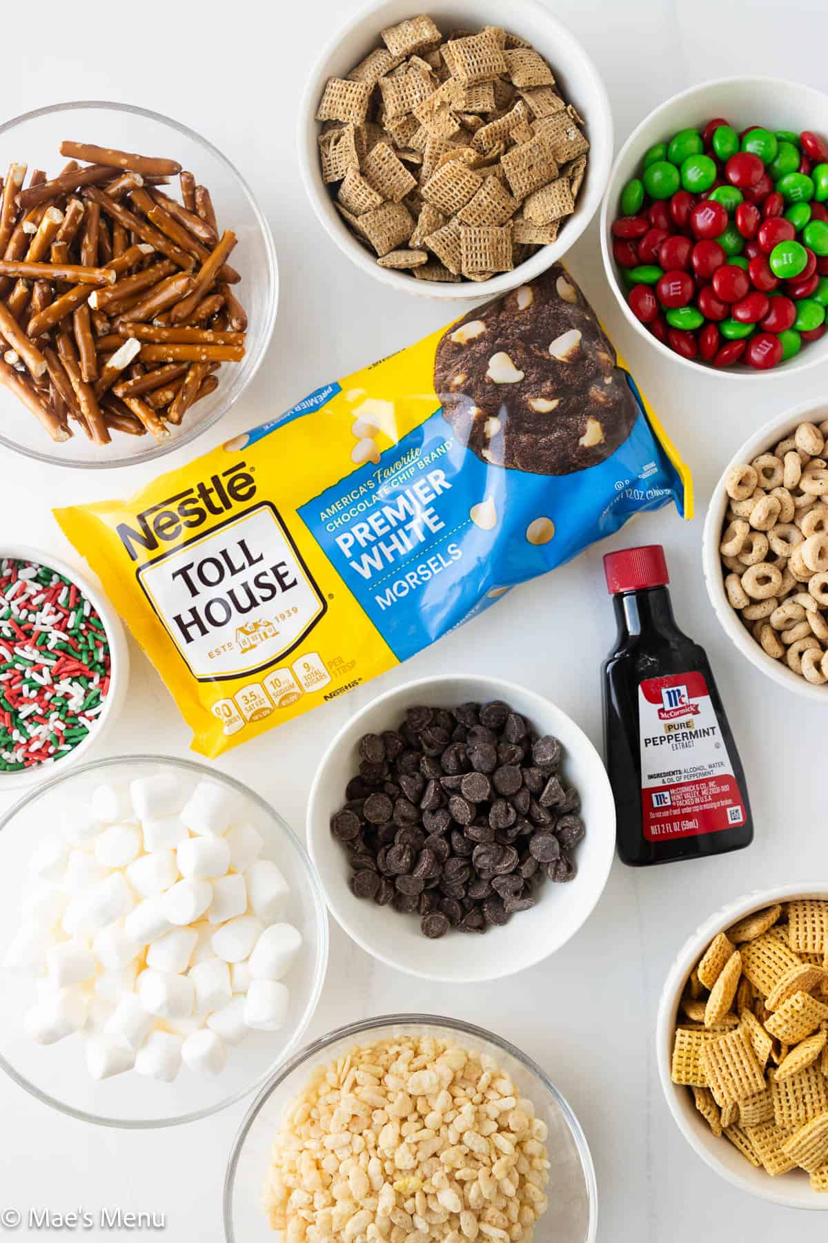 All the ingredients for this christmas chex mix recipe on the counter.