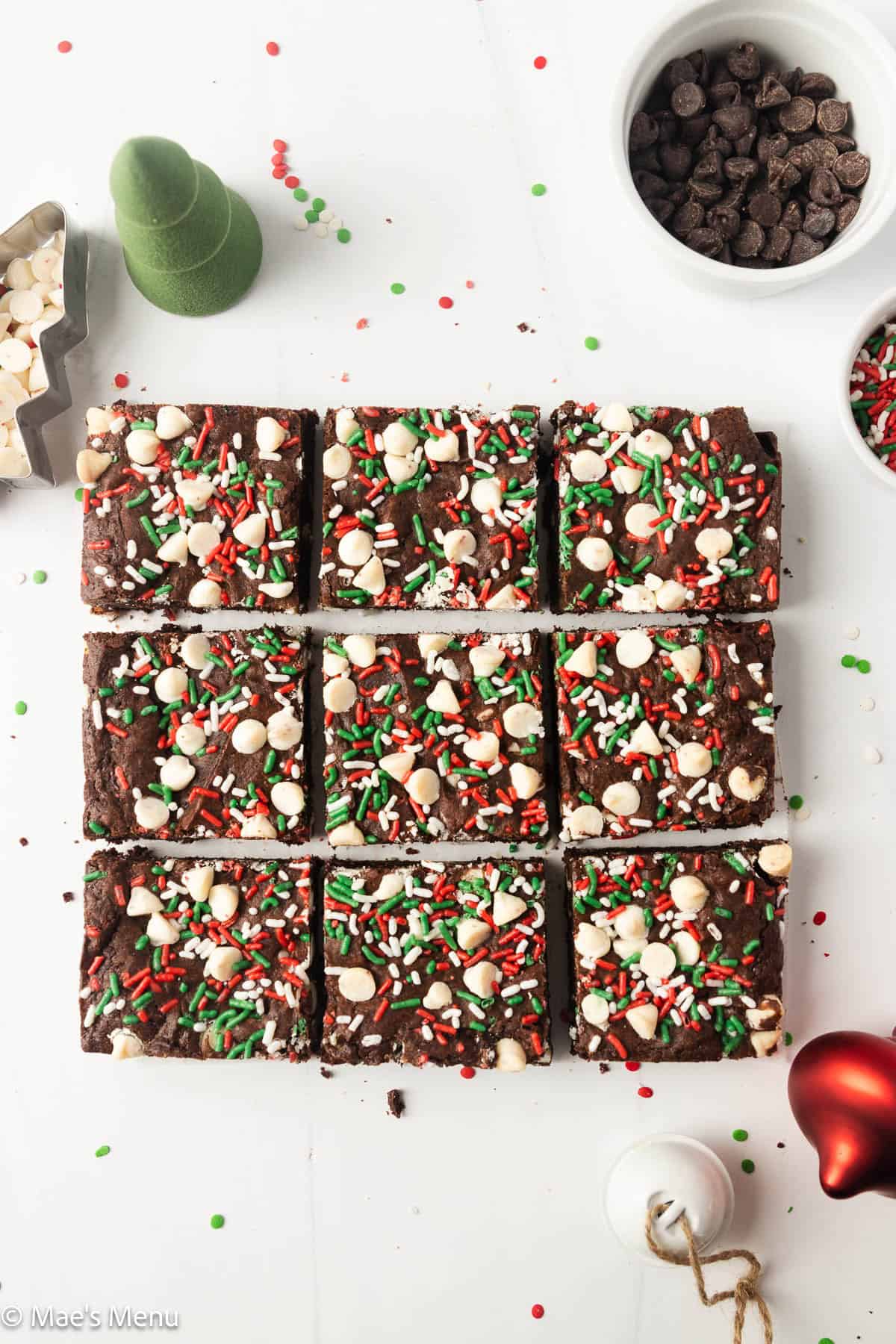 An overhead shot of a pan of Christmas peppermint brownies, sliced before serving.