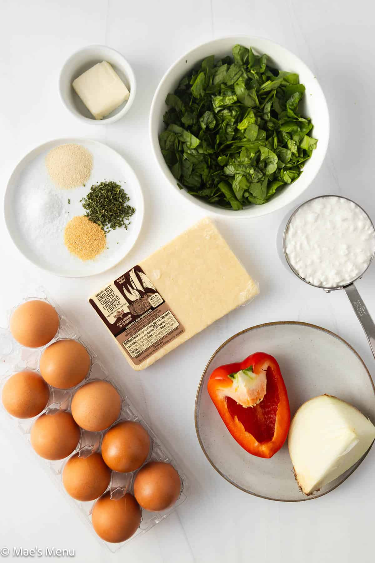The ingredients needed to make high protein egg muffins on the counter.