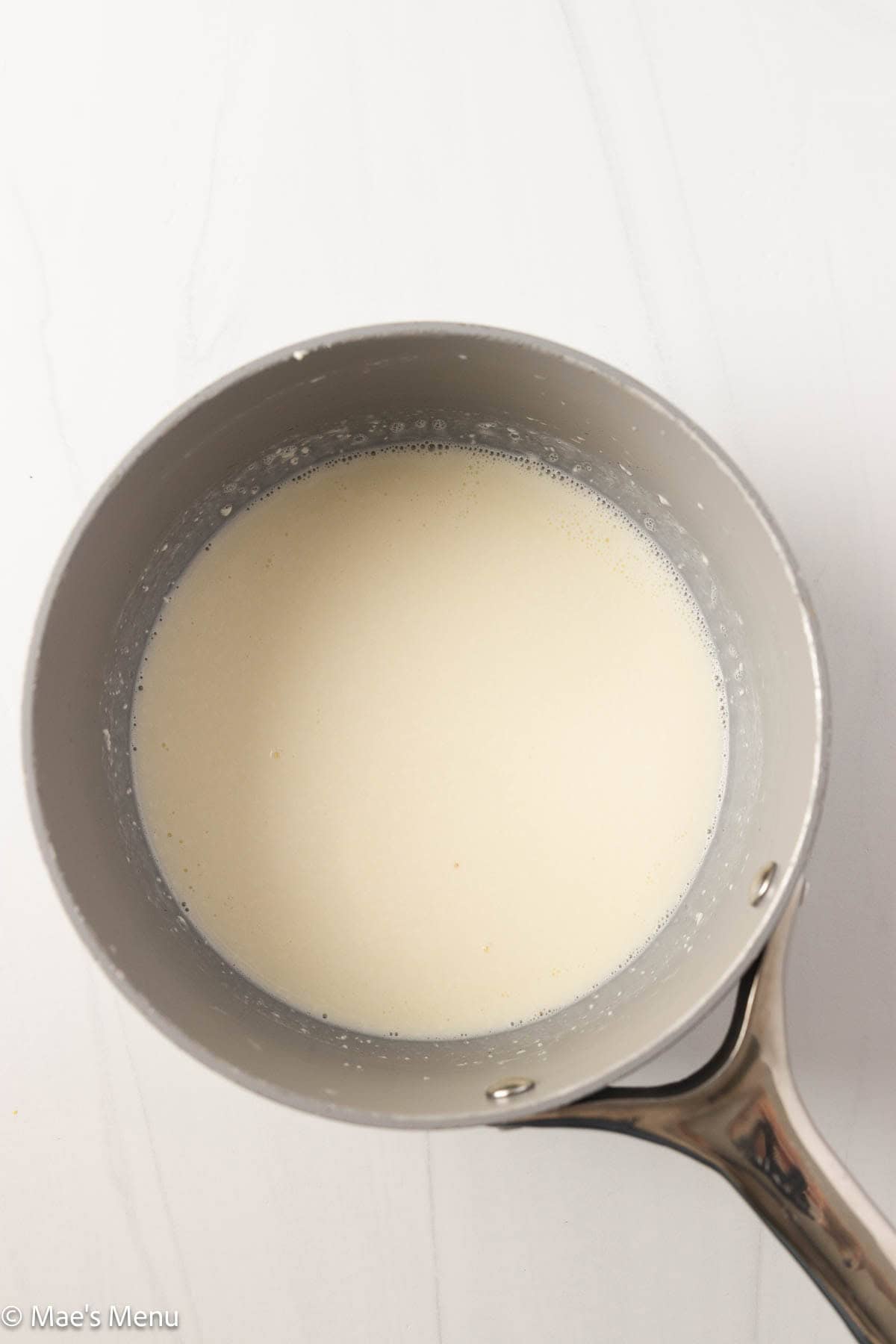 An overhead shot of the melted dairy mixture.