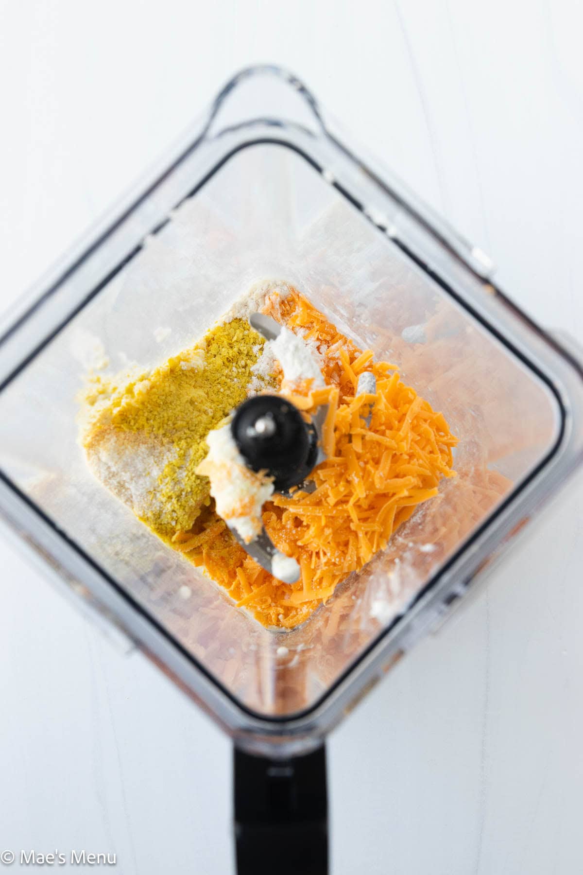 The ingredients for the high protein mac and cheese sauce in the blender.