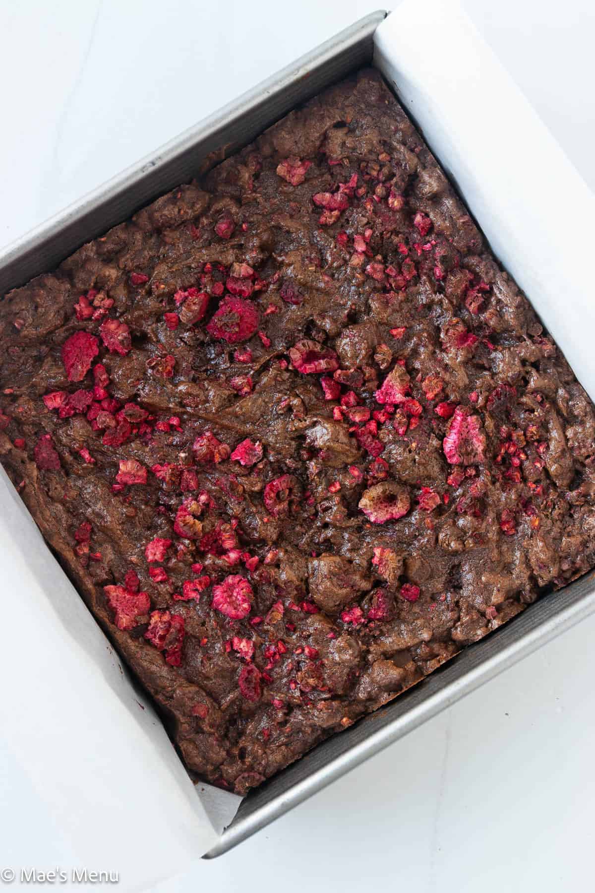 A pan of fresh-baked raspberry brownies.