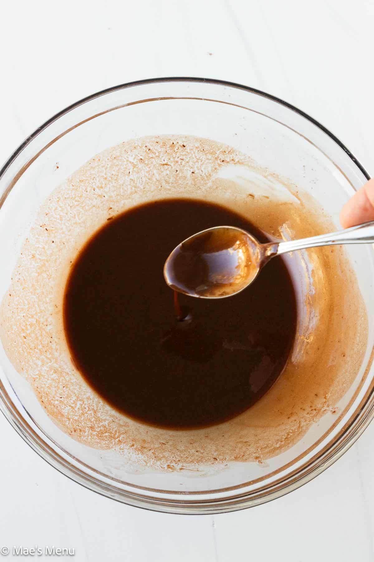 Melted butter and chocolate in a bowl.