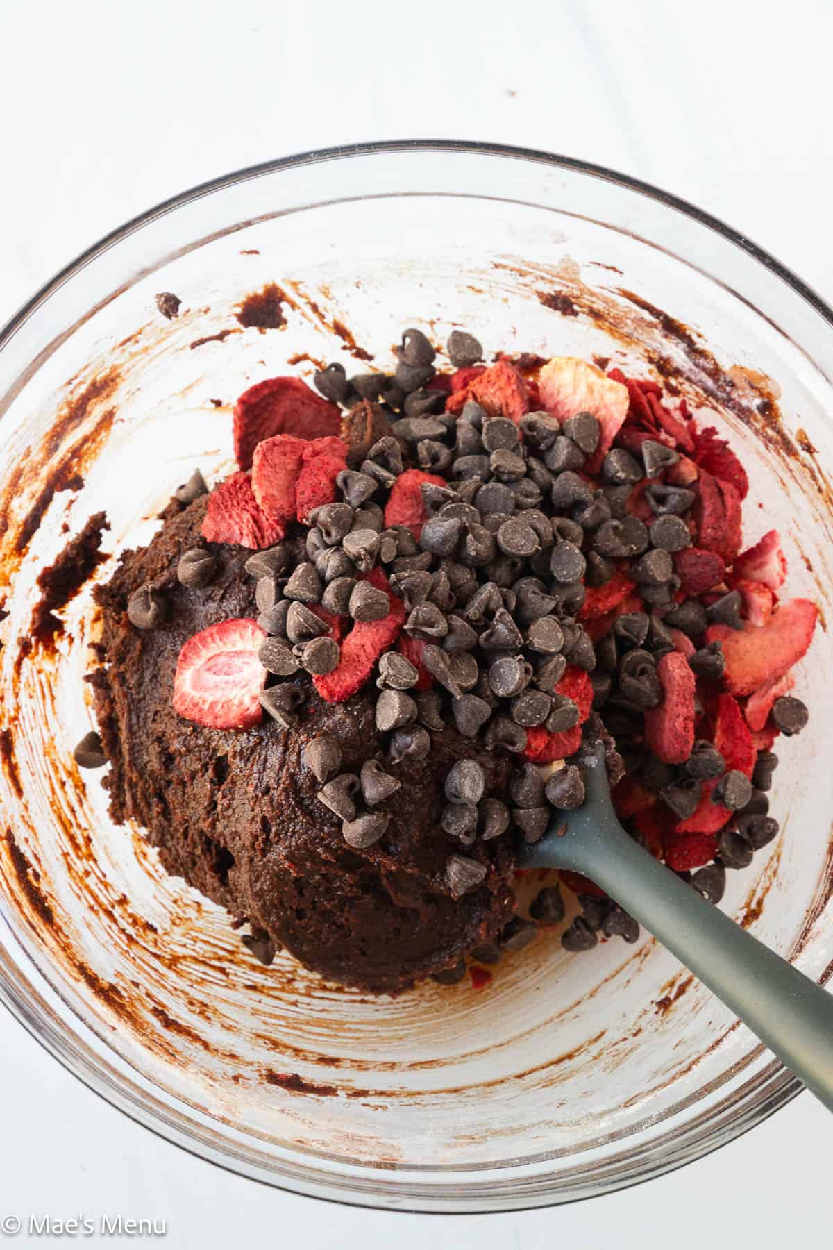 An overhead shot of strawberry brownie batter.