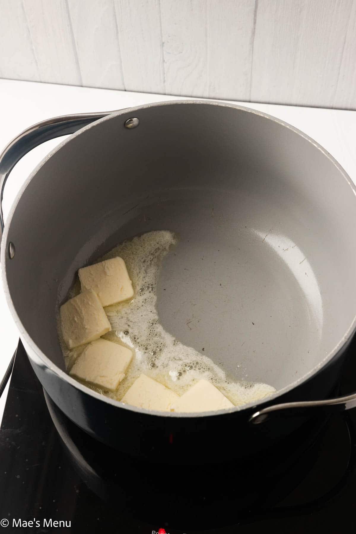 Butter melting in a large pot.