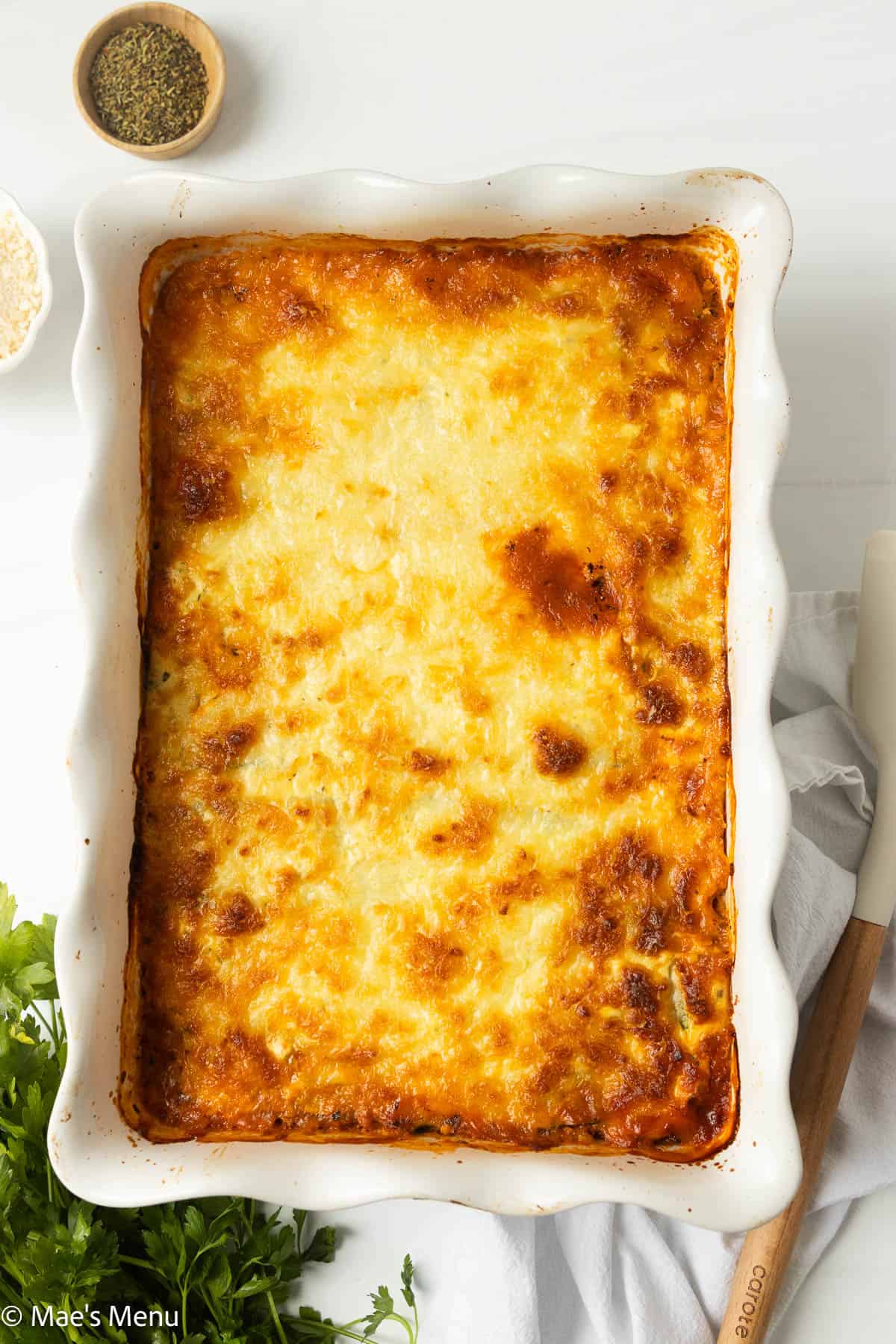 An overhead shot of a pan of baked zucchini lasagna.